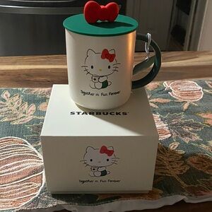 Starbucks Hello Kitty Mug with Green Lid and Red Bow